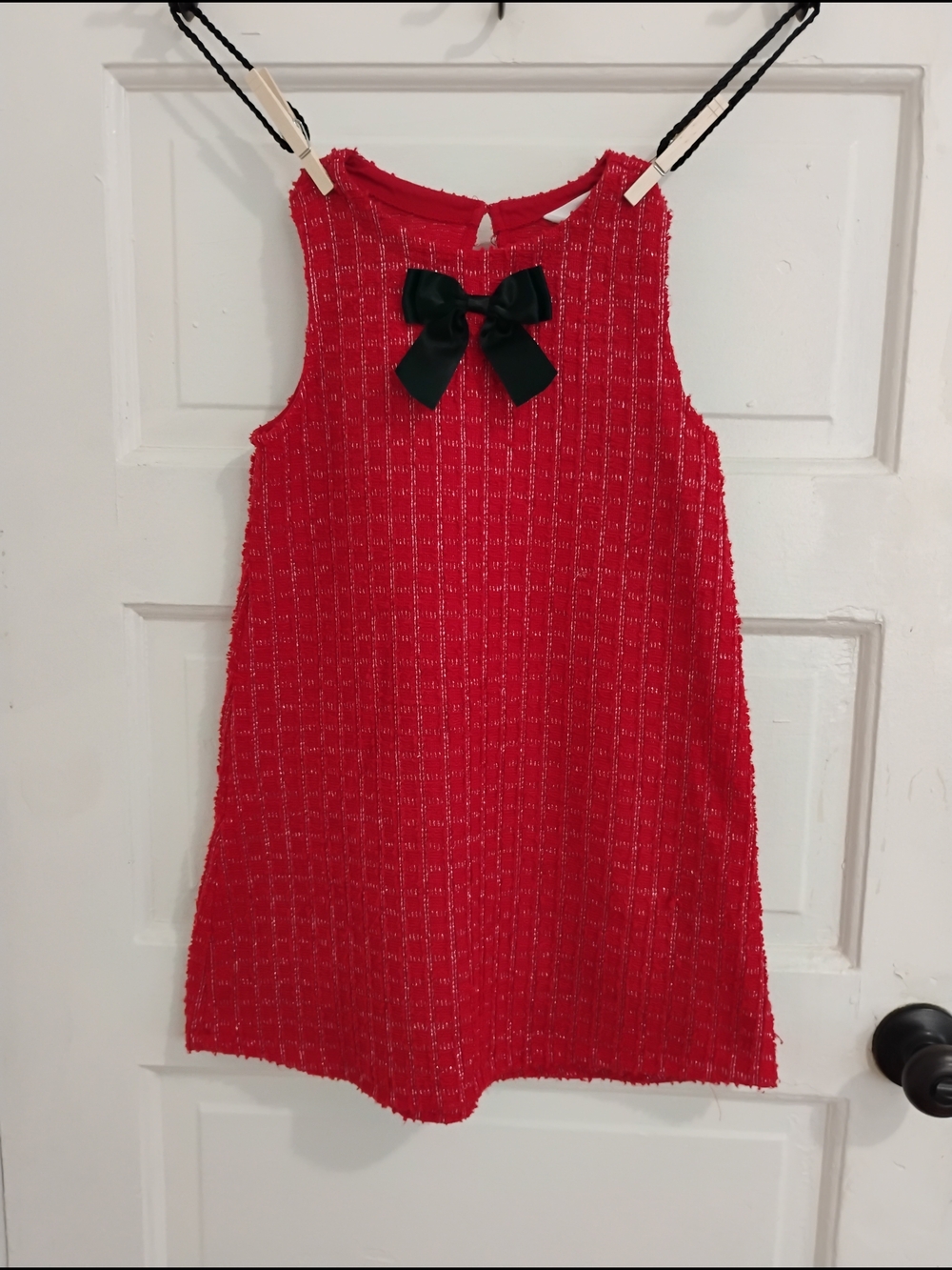 The Perfect Holiday Red Sleeveless Textured Dress with Black Bow